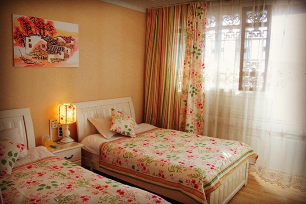 Yunxi Inn Lijiang  Rom bilde