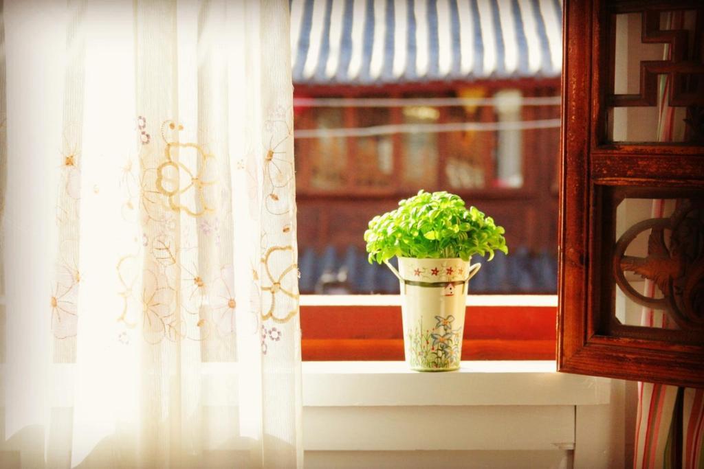 Yunxi Inn Lijiang  Rom bilde