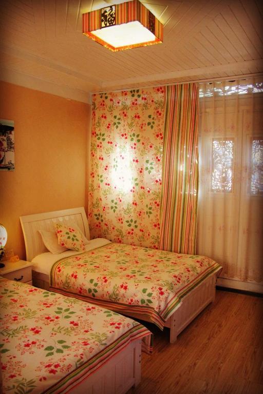 Yunxi Inn Lijiang  Rom bilde