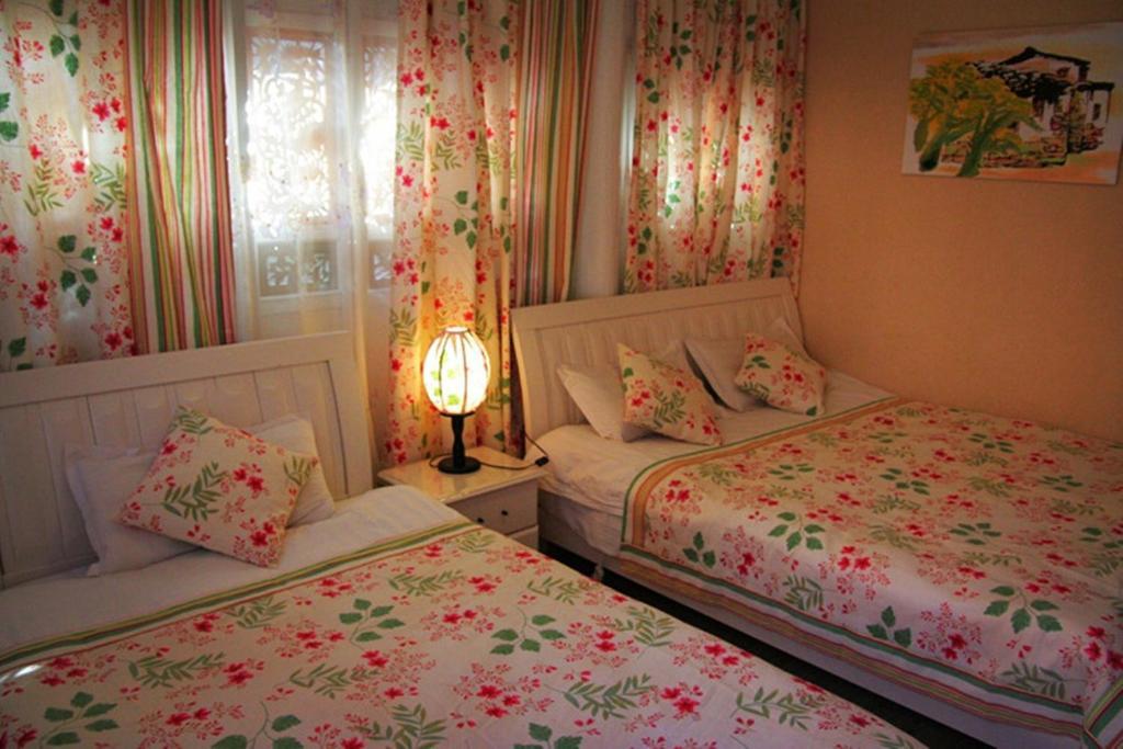 Yunxi Inn Lijiang  Rom bilde