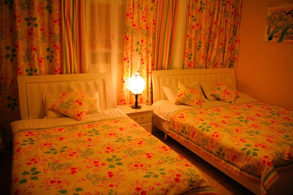 Yunxi Inn Lijiang  Rom bilde